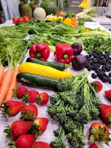 produce spread on counter, abundant fruits and vegetables