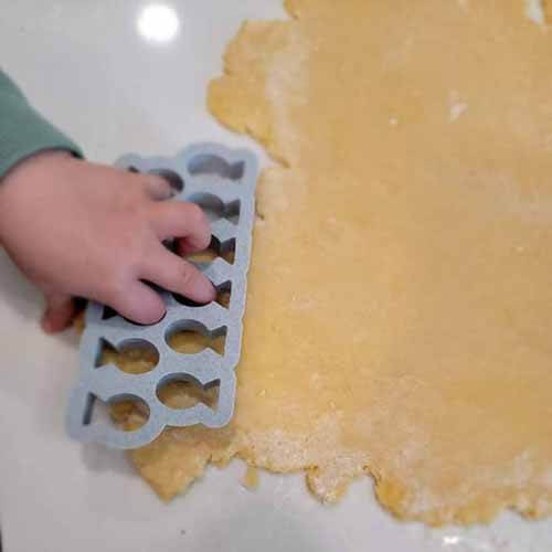 An adorable goldfish cracker cutter used on cracker dough