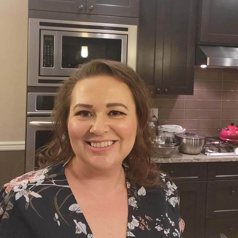 Amy in the kitchen of her first in-home presentation for The Cross Legacy